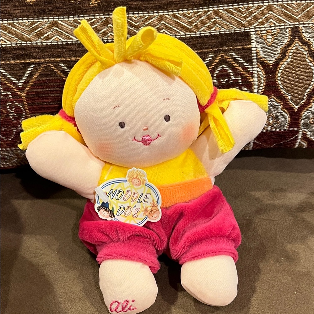 Noodle Do’s Ali Yellow and Pink Plush Doll
